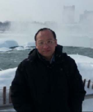 王开明（中国地质大学经济管理学院教授）